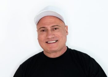 Danny Tenaglia white hat black shirt white background
