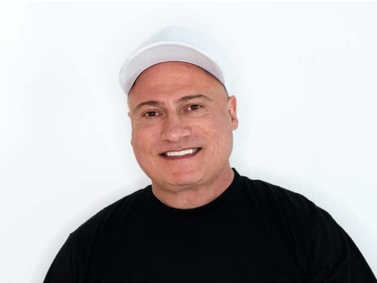 Danny Tenaglia white hat black shirt white background