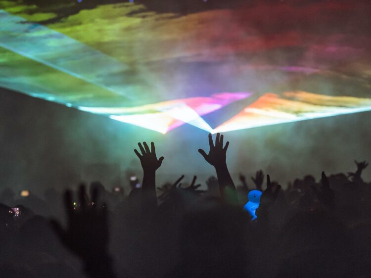 Portola Festival crowd hands lasers