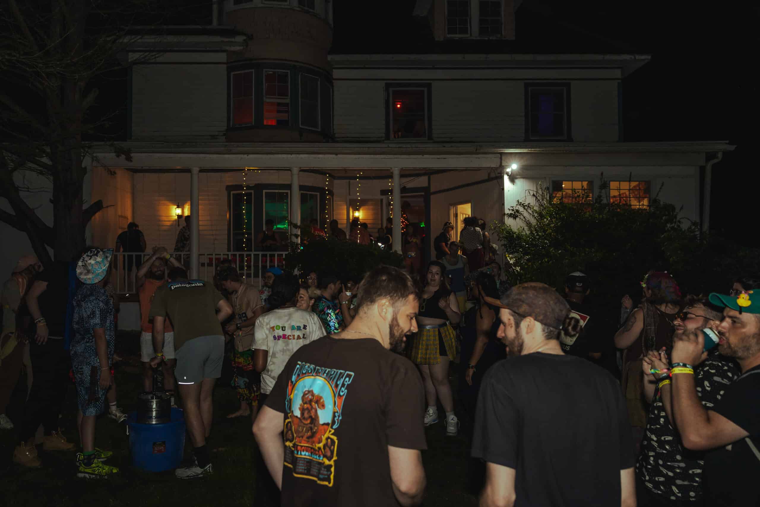 Festival attendees gather around the outside of the Project X House Party at Showcation 2025