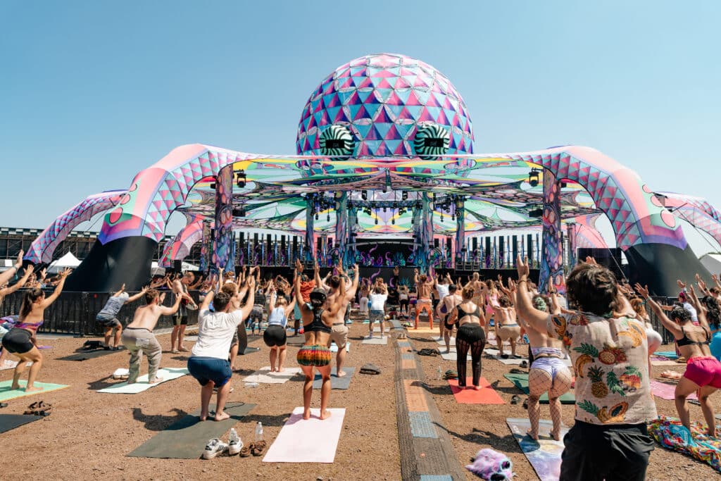 Elements Festival 2025 - Festival Goers Doing Yoga at the Water Stage