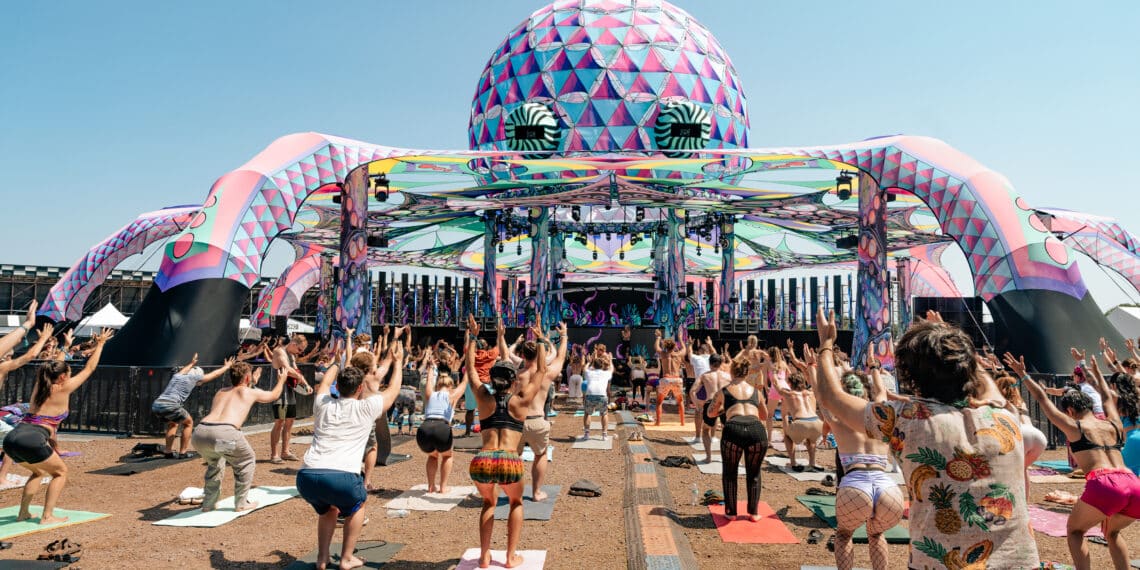 Elements Festival 2025 - Festival Goers Doing Yoga at the Water Stage