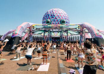 Elements Festival 2025 - Festival Goers Doing Yoga at the Water Stage