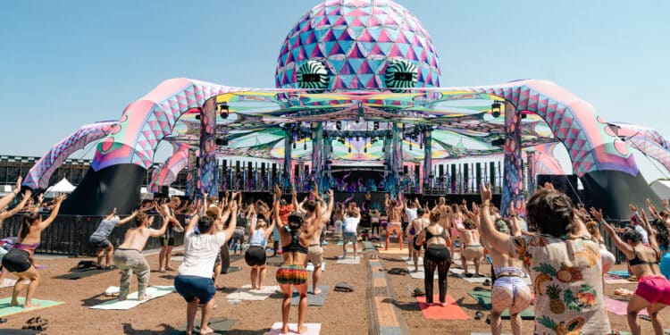 Elements Festival 2025 - Festival Goers Doing Yoga at the Water Stage